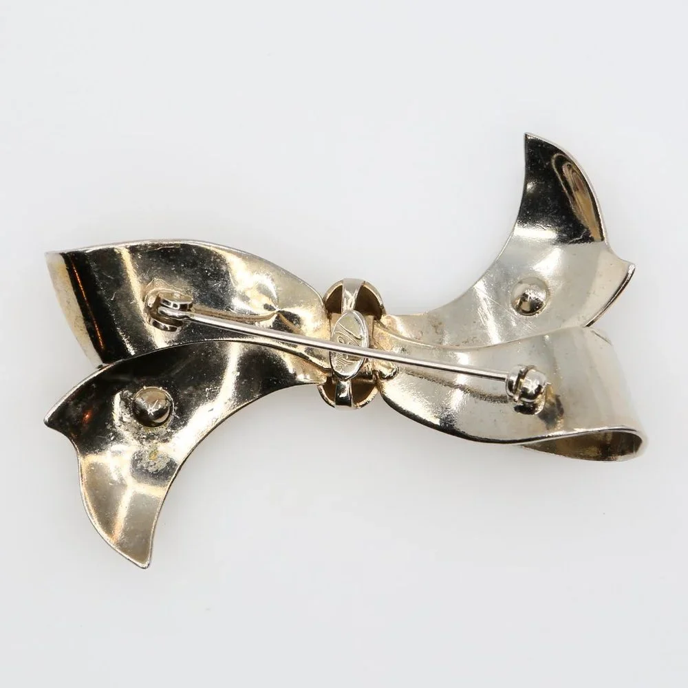 Vintage Natalie Art Moderne Silver Tone Bow Brooch With Orange Rhinestones 1940s